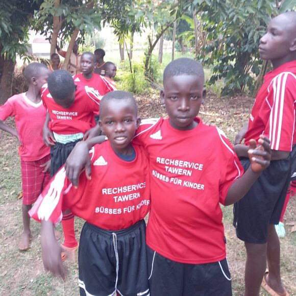 Children in the donated jerseys