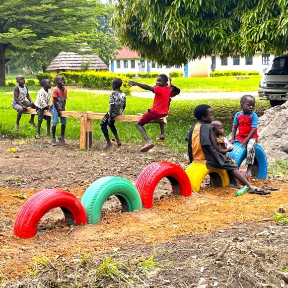 The finished tyre course with children playing